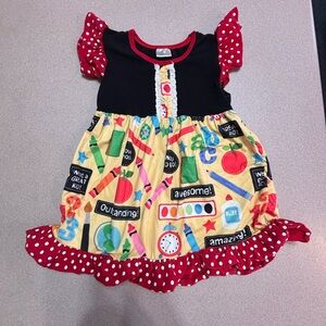 Colorful Kids Dress with Polka Dot Accents